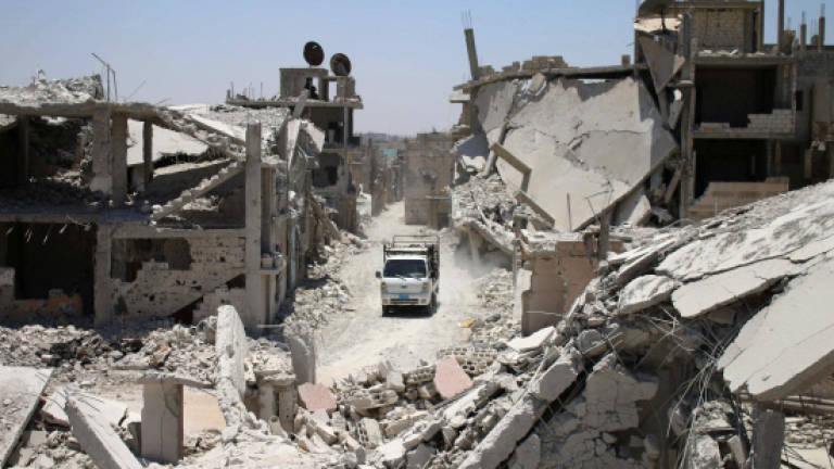 30 civilians dead in anti-IS strikes in Syria: Monitor