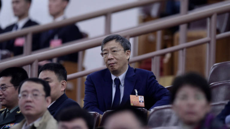 China names reform-minded Yi Gang to lead central bank