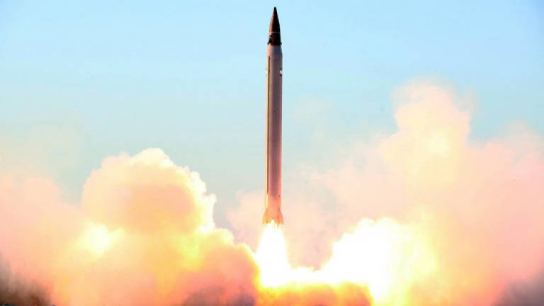 Iran confirms missile test, denies breach of nuclear deal