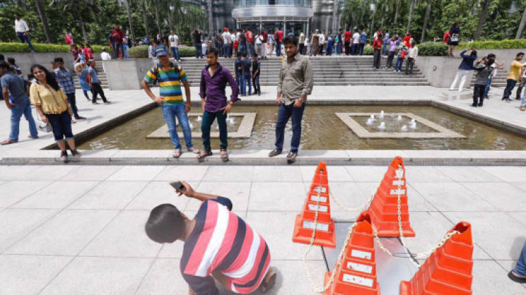 Foreign workers 'flood' the city on second day of Aidilfitri
