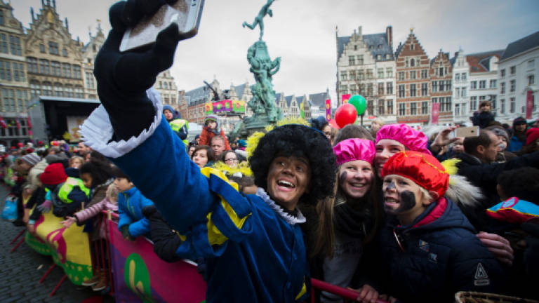 Dutch police arrest nearly 200 protesting 'Black Pete'