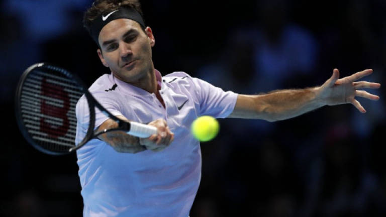 Federer back in the groove at Tour Finals