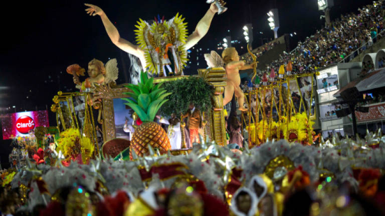 Rio de Janeiro samba parades give politicians a colourful lashing