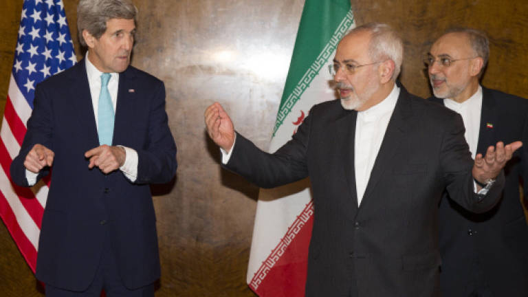 Kerry begins new nuclear talks with Iran FM