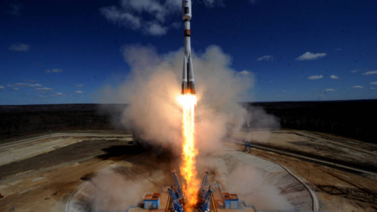 Putin hails first rocket launch from new cosmodrome after delay
