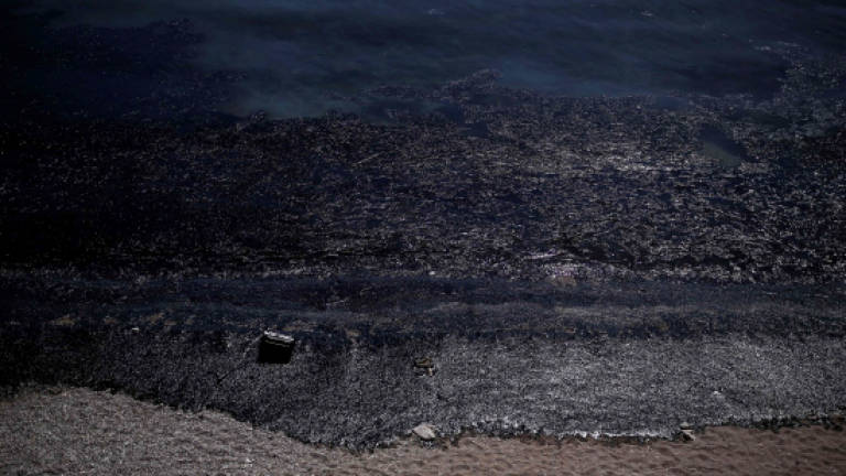 Blame game in Greece as oil spill spreads in Athens' Saronic gulf