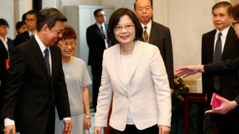 Taiwan's Tsai takes office as hostile Beijing looks on