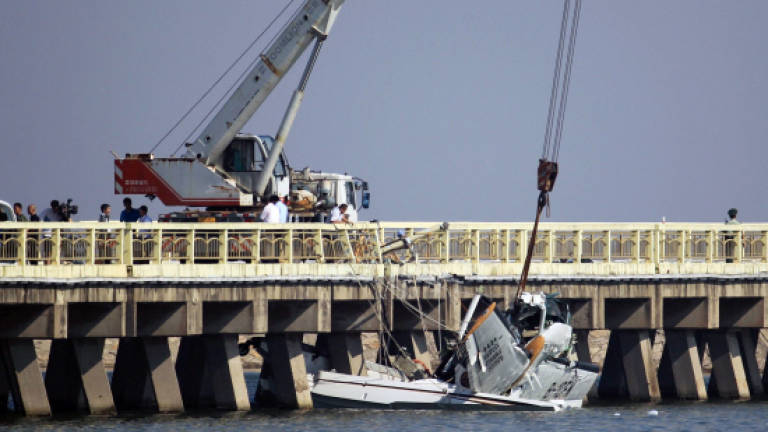 Seaplane hits bridge in Shanghai, killing five