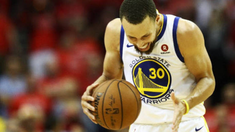 Curry, Durant spark Warriors over Rockets to reach NBA finals