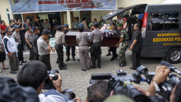 Three more victims identified in AirAsia crash