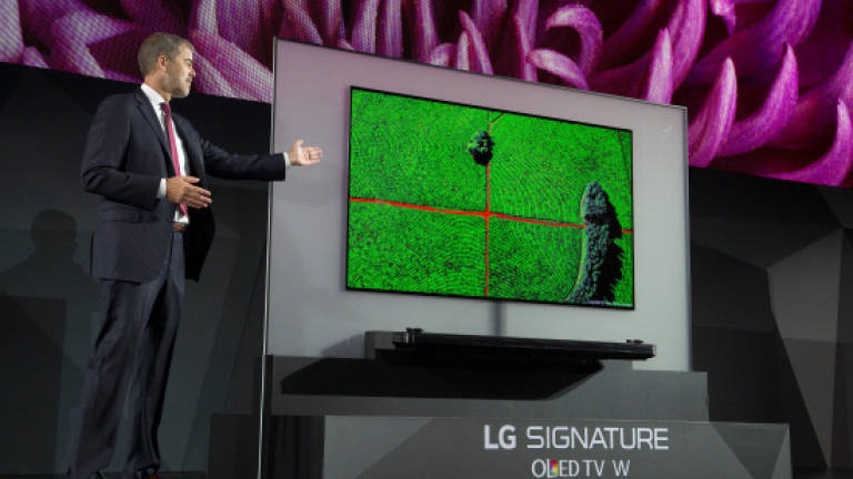 LG kicks off gadget gala with 'wallpaper' thin TV