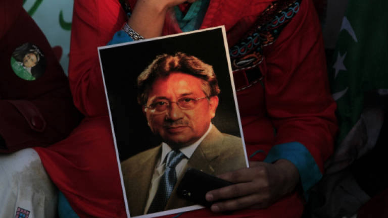 Pakistan's Musharraf at court for first 'treason' hearing