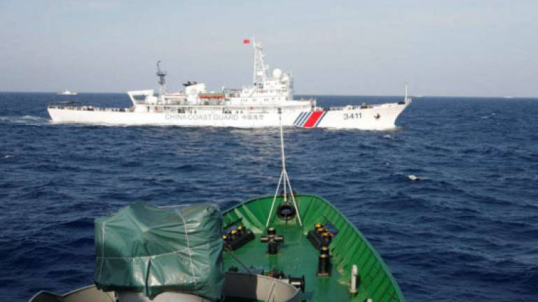 Vietnam says China 'sank' fishing boat in disputed sea