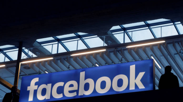 Facebook profit jumps as user ranks grow