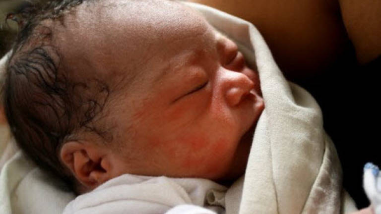 Newly-born baby boy found in petrol station toilet