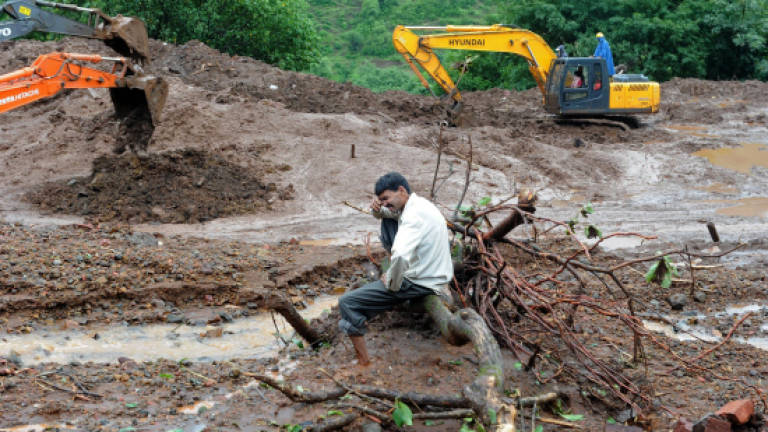 India landslide rescuers press on as toll hits 73