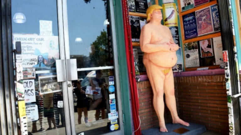 Bidders vie to take home naked Donald Trump