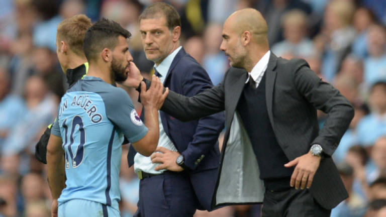 Guardiola ready to play on without Aguero