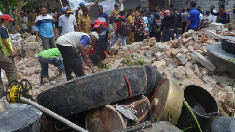 Seven killed in Indonesia building collapse