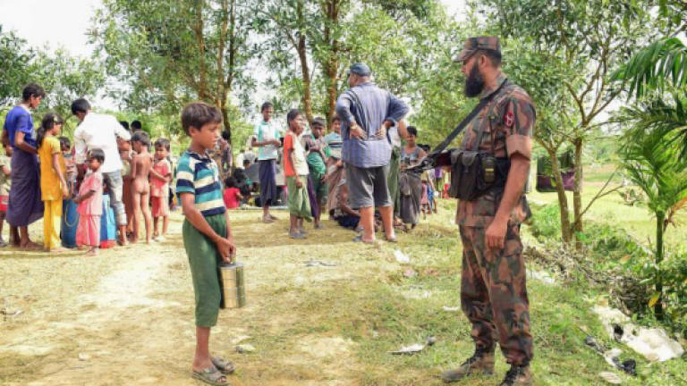 Bangladesh offers Myanmar army aid against Rohingya rebels