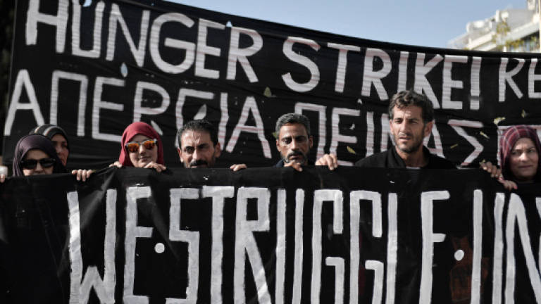 Syrians end two week hunger strike in Athens