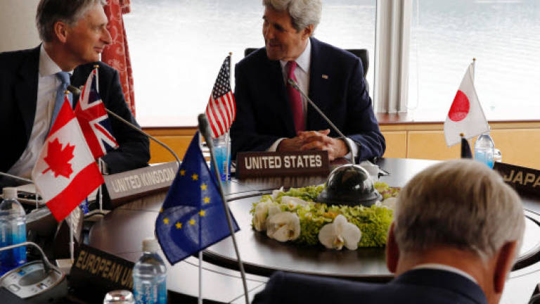 Kerry arrives in Japan for landmark Hiroshima visit