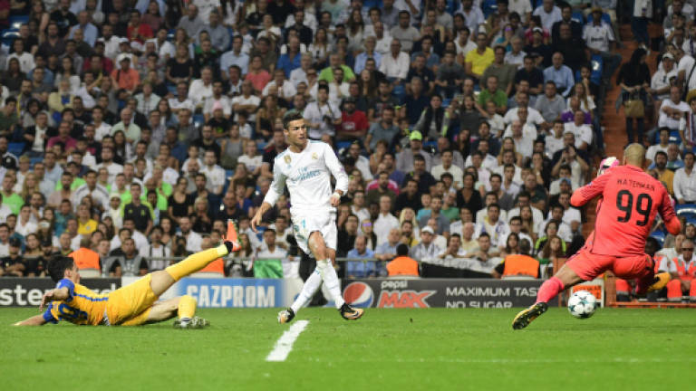 Returning Ronaldo hits double in routine Real win