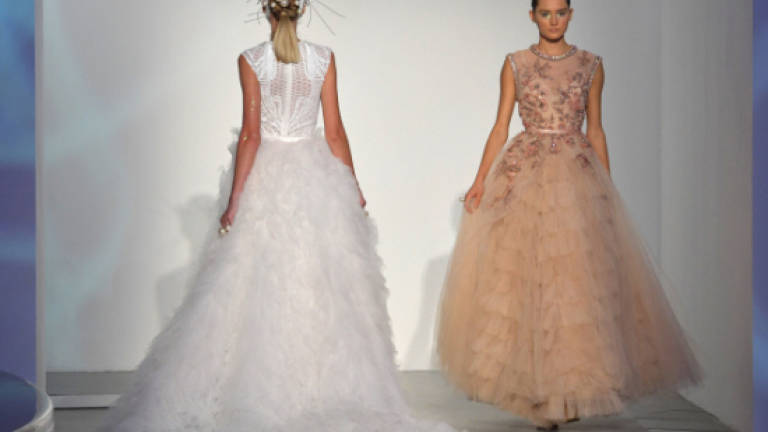 Fairies, brides in black descend on Arab Fashion Week