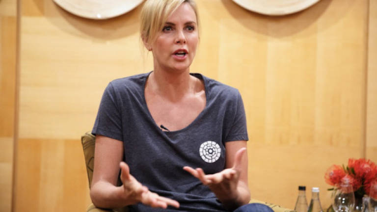 Actress Charlize Theron dreams of AIDS-free S.Africa