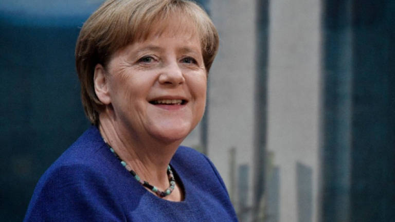 Merkel embarks on Germany's 'strangest' campaign