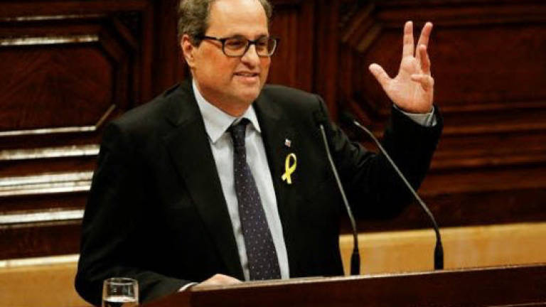Party clears way for separatist to be Catalan president