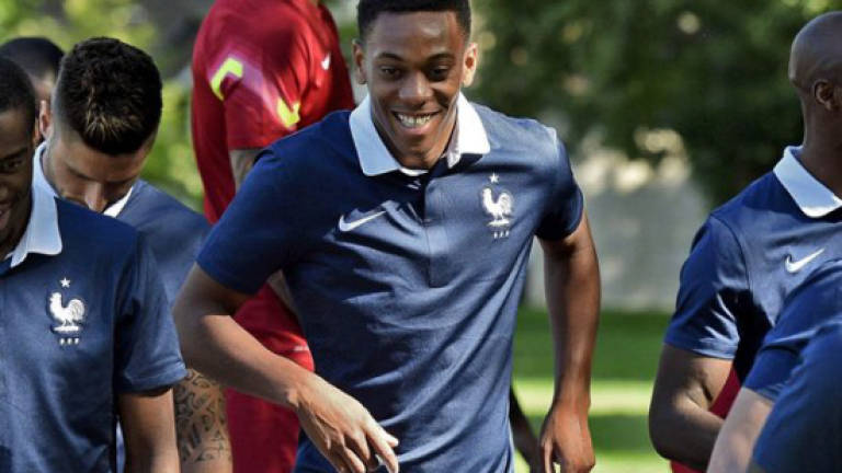 Martial the newcomer off France's football assembly line