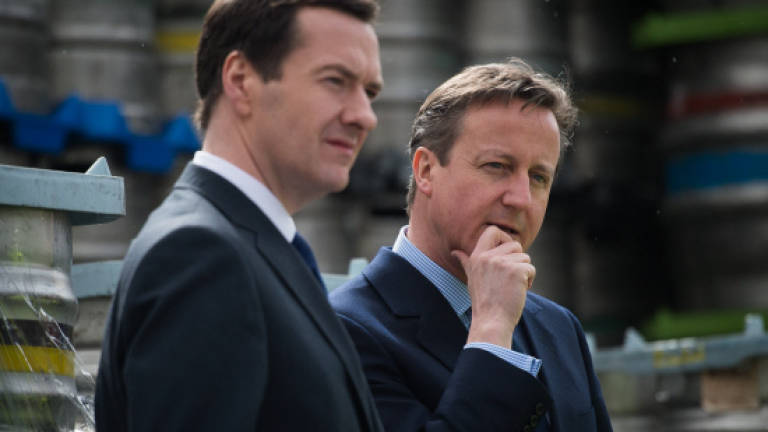 Cameron, Miliband join seven-way UK election debate