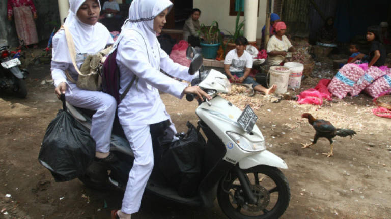 Indonesia's poor swap garbage for health care