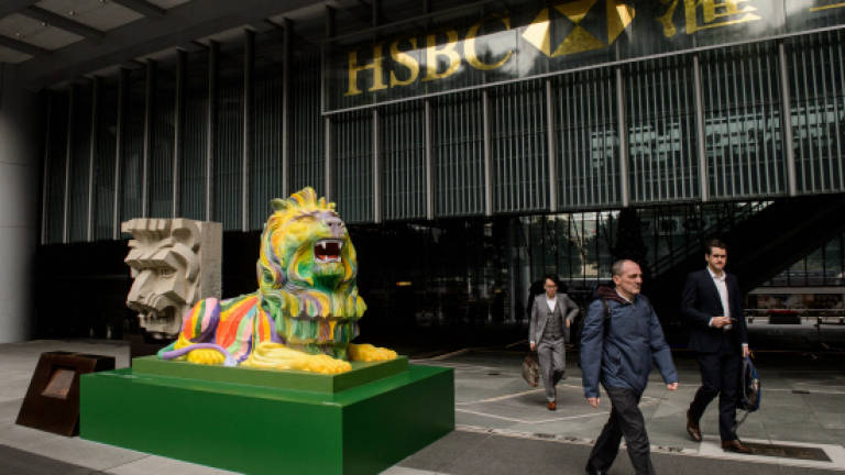HSBC's rainbow lion statues spark row in Hong Kong