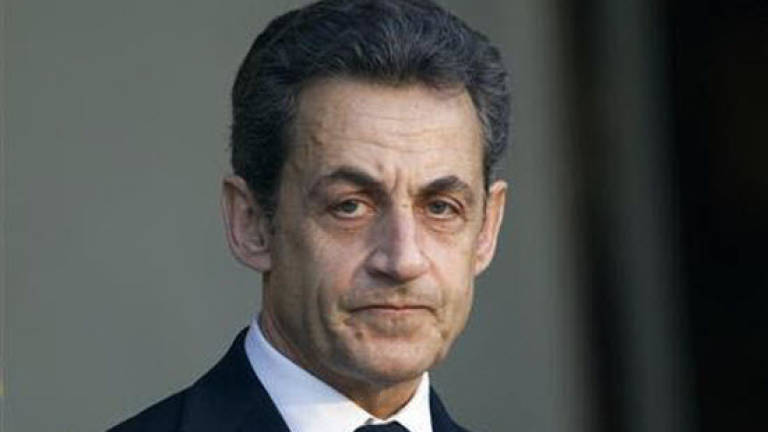 France's Sarkozy hit by new phone tap leaks