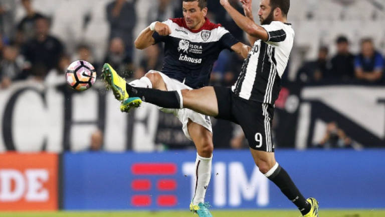 Higuain back as Juve reclaim top spot from Napoli