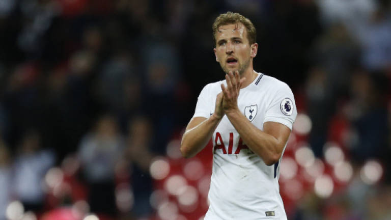 Kane fires Spurs into Champions League as Chelsea's charge falters
