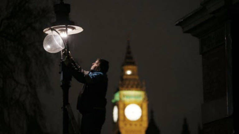 Lamplighters keep London's history burning