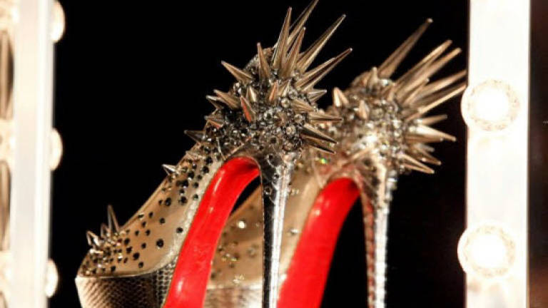 Shoemaker Louboutin wins EU court battle over red soles