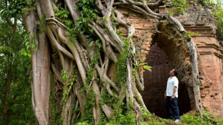 Bombed and looted ancient Cambodian city poised for rebirth