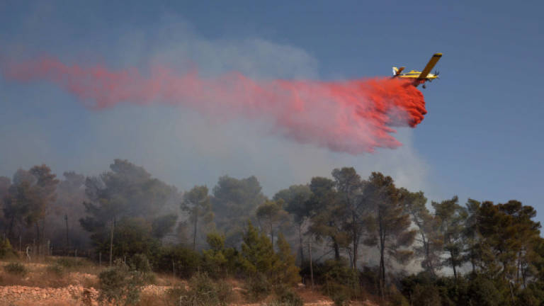 Israel firefighters say all fires extinguished
