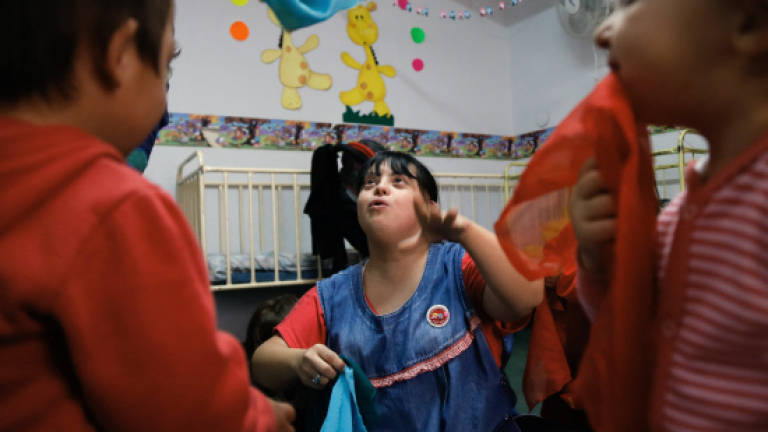 Argentine woman with Down syndrome inspires as teacher