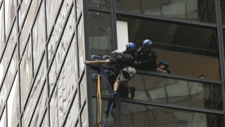 Trump Tower climber captured after three-hour ascent