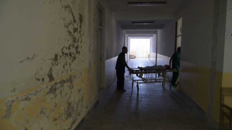Creaking Afghan hospital symbol of foreign aid failure