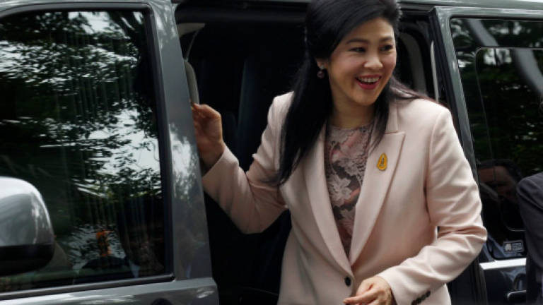 Two years after coup ousted Thai PM says country 'suffering'