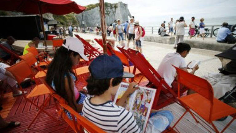 Holiday reads: Beachgoers check out French seaside libraries