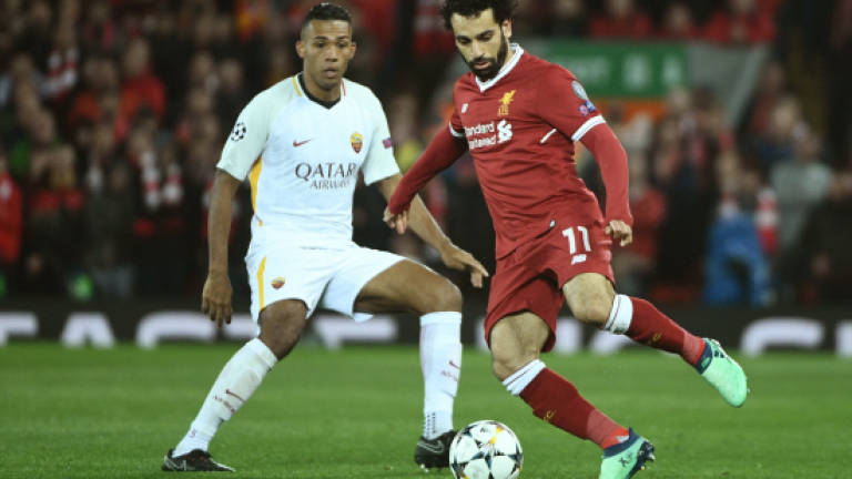 Salah superb but five-star Liverpool give Roma lifeline