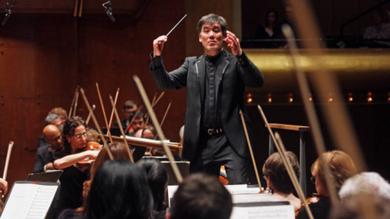 In tense times, top conductor creates UN of orchestras