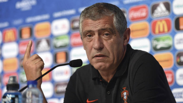 Portugal coach defends Alves tough tactics